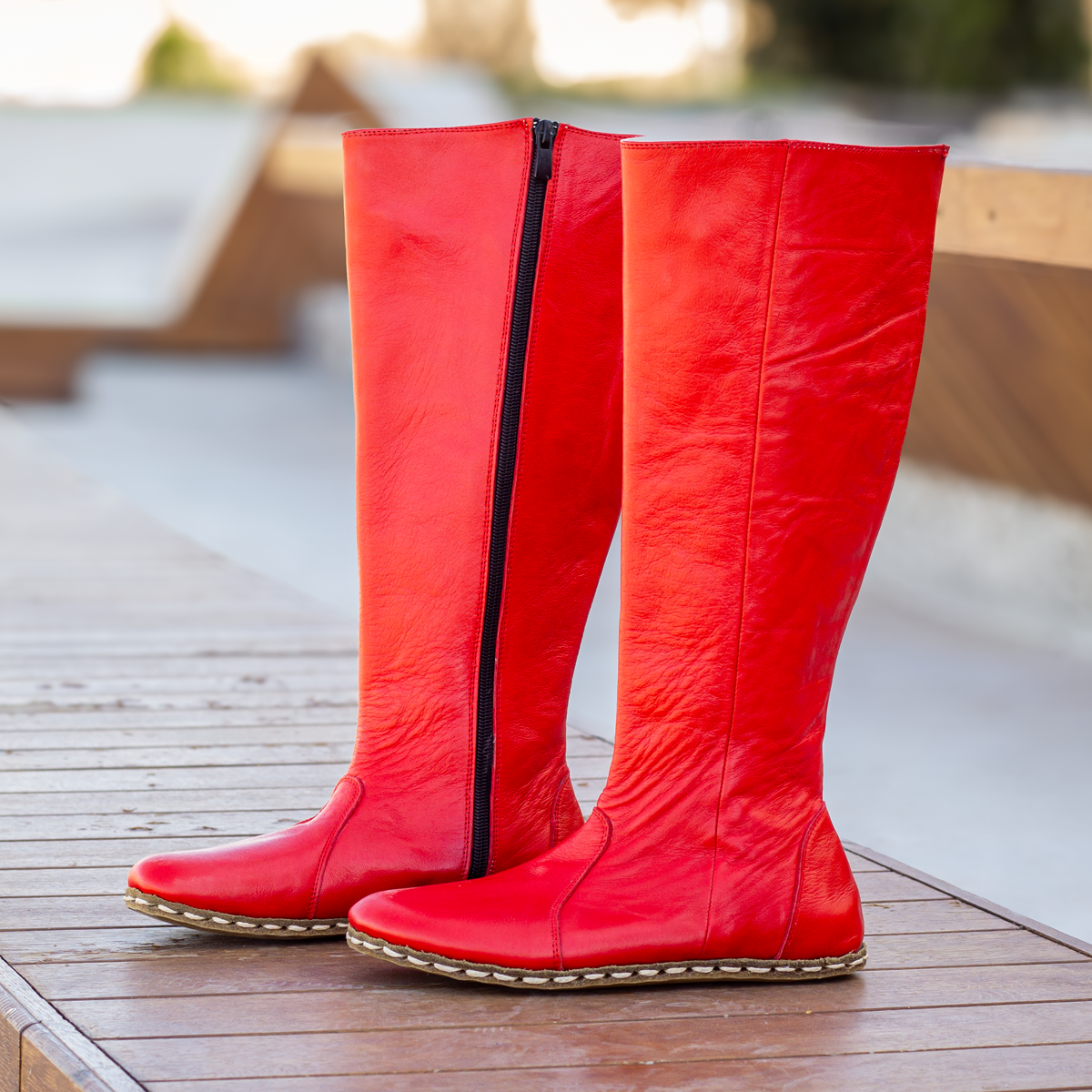 Red leather knee high flat boots sales
