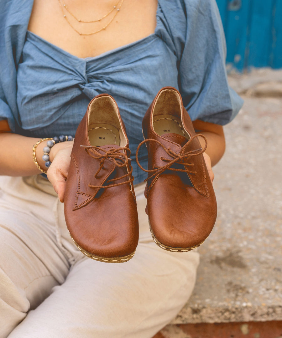 Discharging Body Electricity with Handcrafted Grounding Shoes