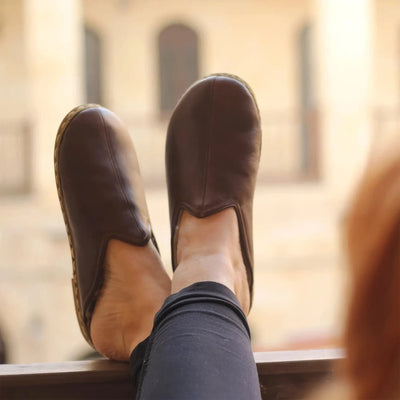 bitter brown barefoot close toed slippers