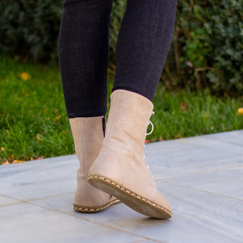grounding barefoot cream lace up boots for women