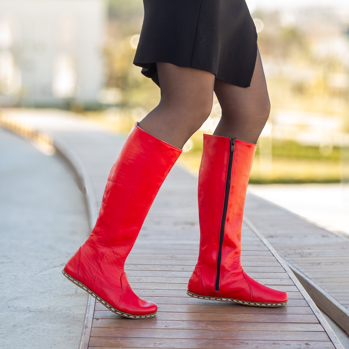Flat red knee high boots discount